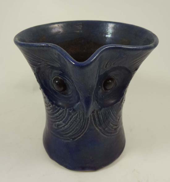 An early 20thC novelty waisted jug in the form of a blue owl. Probably Farnham Pottery for