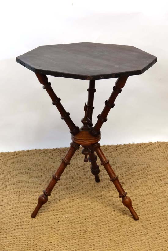 A Victorian octagonal 3 legged mahogany gypsy table 20 1/4" diameter 25 1/2" high