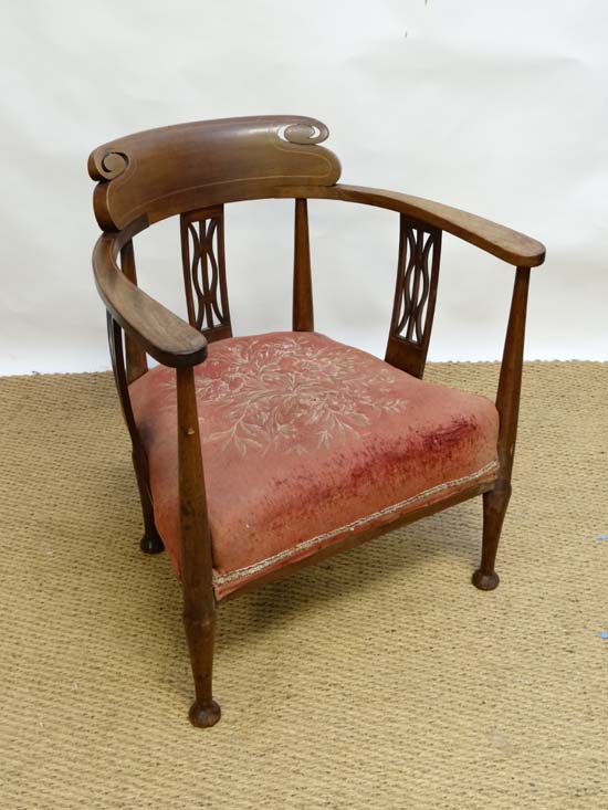 An early 20thC mahogany open armchair with upholstered seat and boxwood inlay 27 3/4" high