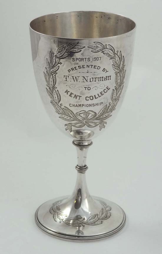 A silver plate trophy cup engraved ` Sports 1907 Presented by T W Norman to Kent College