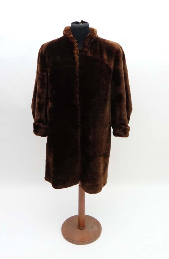 Vintage Retro : a ladies Beaver Skin coat with brown silk lining.