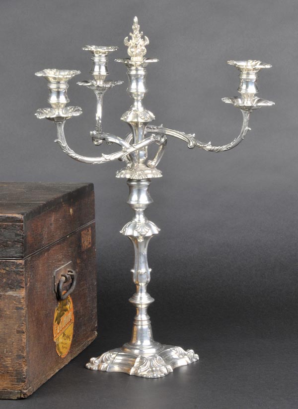 *A Victorian silver four-light candelabrum, the knopped column supported by three branches each with