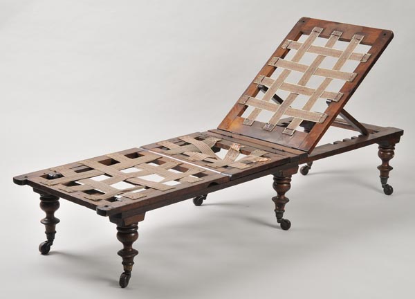 * A 19th century adjustable Campaign bed by Cox & Painter, Malvern, hinged for folding with
