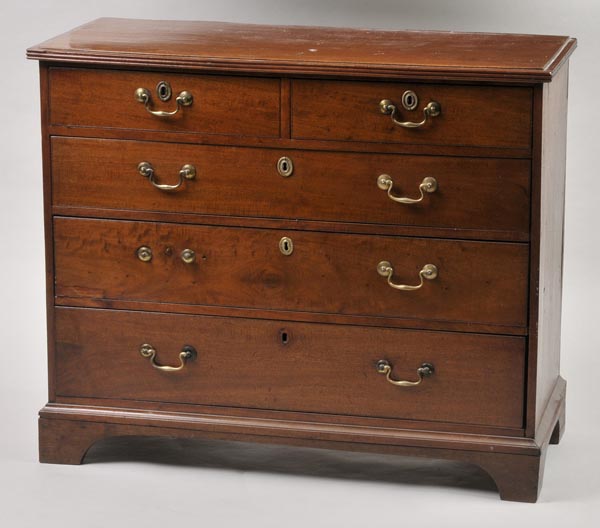 * A 19th-century mahogany straight front chest of two short and three long drawers, on bracket