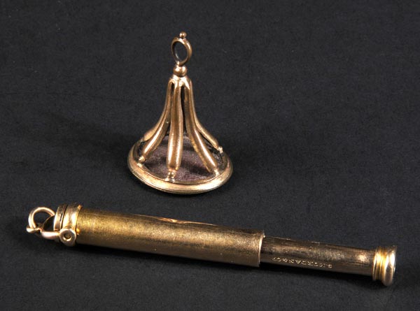 * A Victorian Samuel Mordan & Co. gold coloured metal propelling pencil, with swivel suspension loop