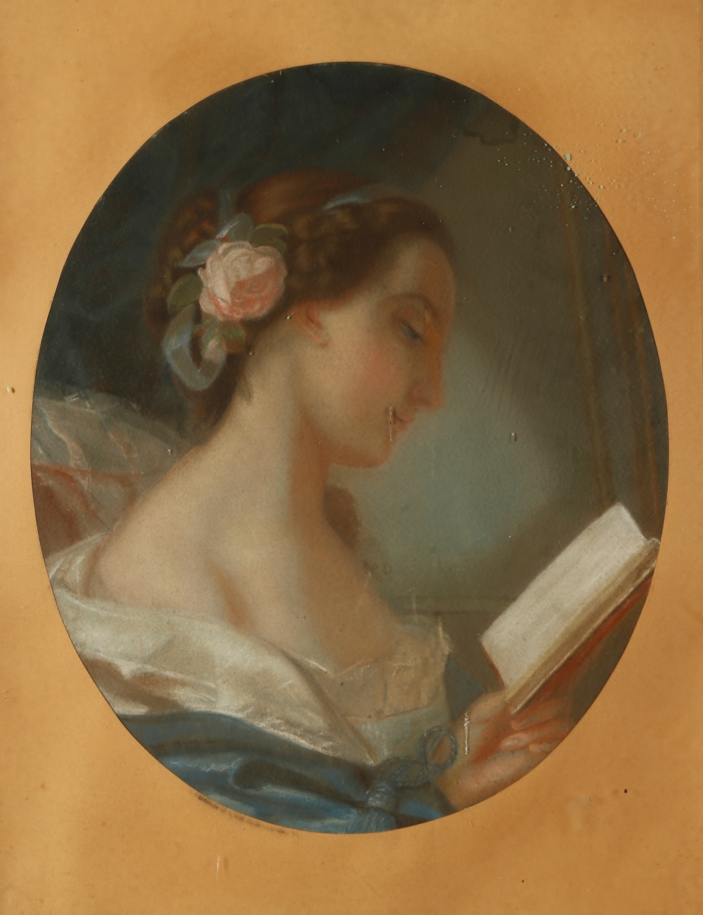 ENGLISH SCHOOL 19th century, A portrait of a young girl with flowers in her hair reading from a