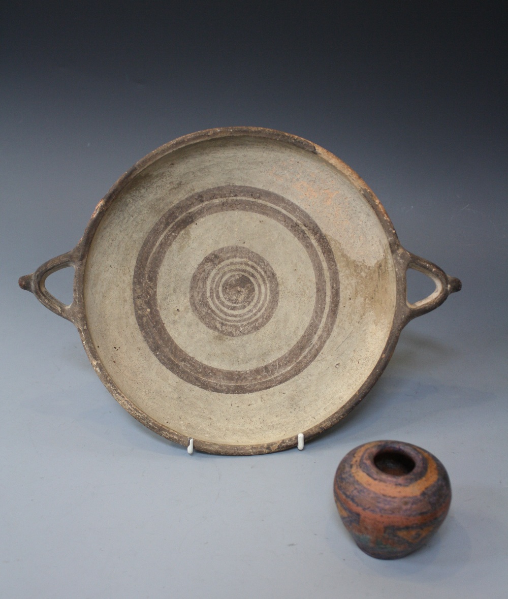 A PRIMITIVE POT, possibly Mayan with geometric and banded decoration, 2.5" high, and a pottery