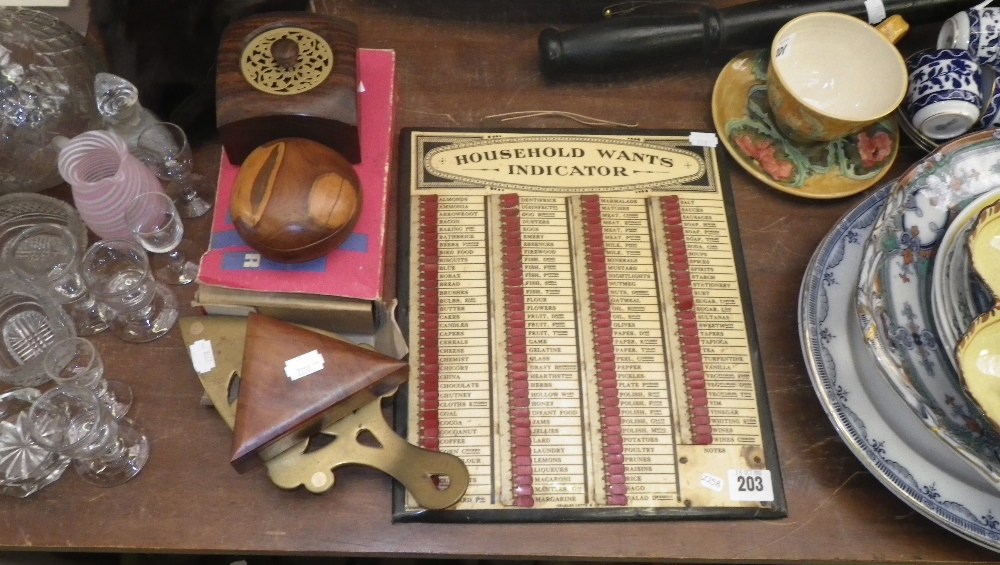 An early 20th century `Household Wants indicator`, a collection of wooden boxes and similar items