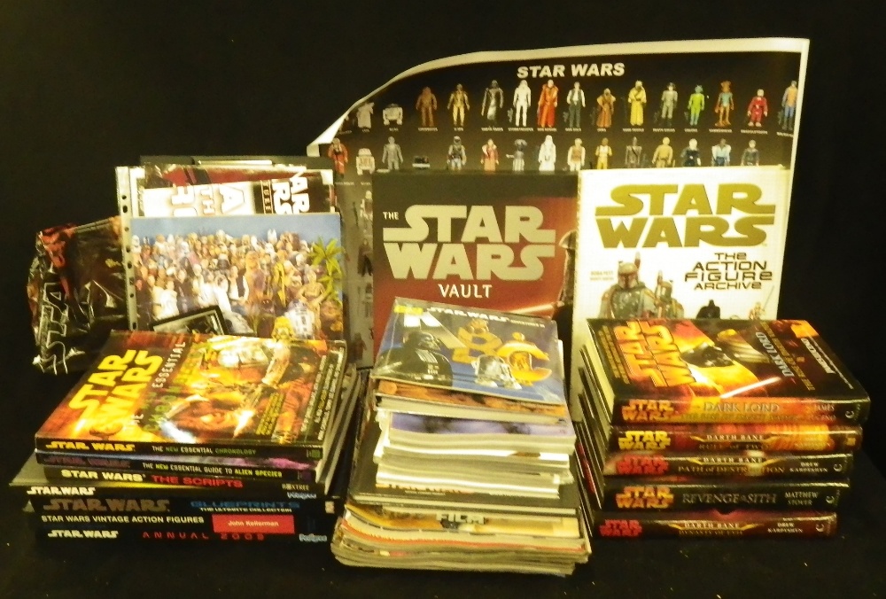 A collection of books relating to Star Wars including `The Star Wars Vault`, published by Simon &