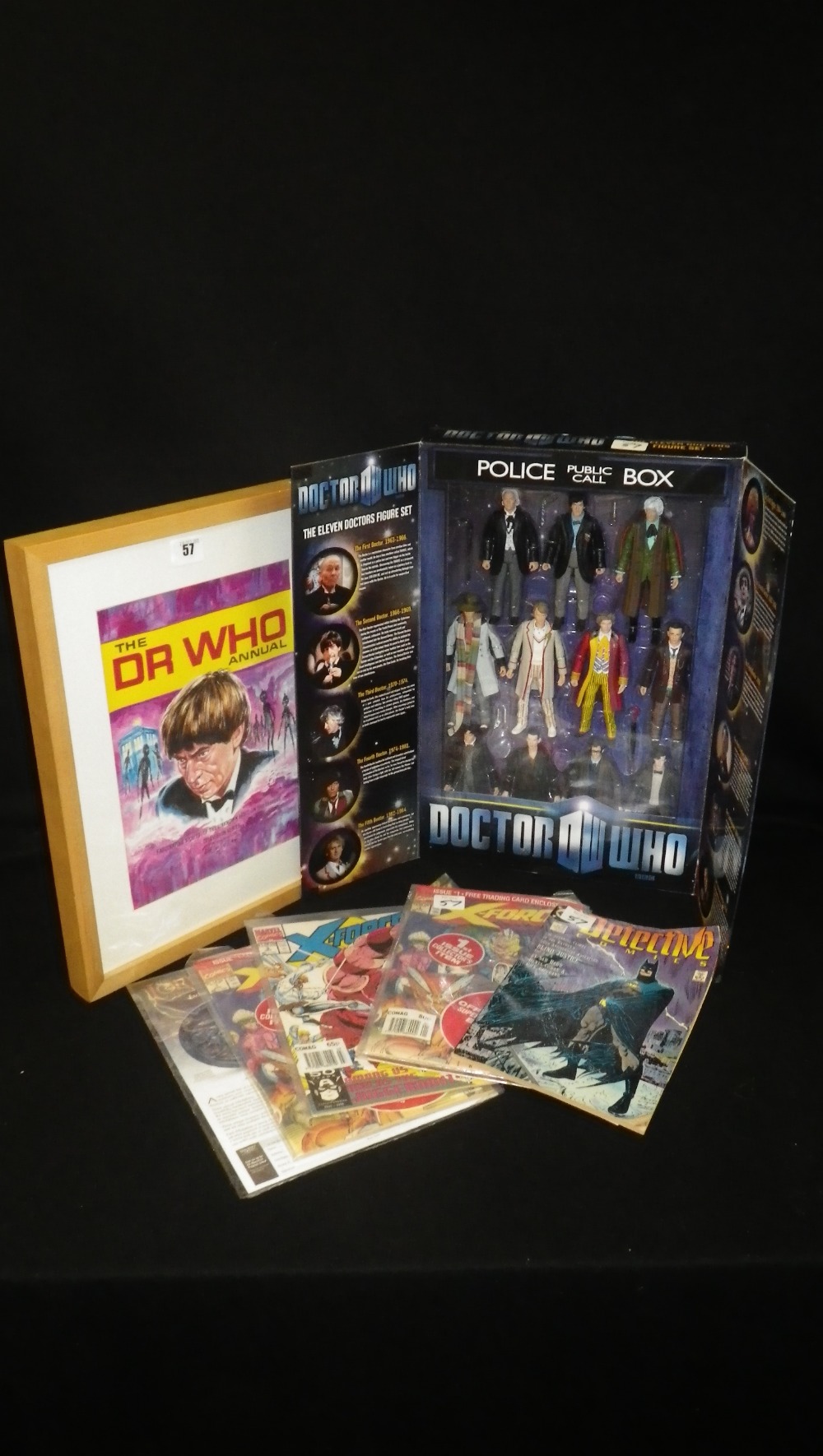 A Dr Who 11 Dr figure set in original packaging, Dr Who framed print, signed by Walt Howarth and