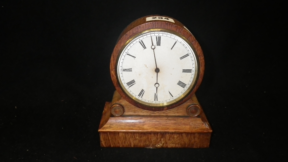 A Victorian oak cased mantel clock