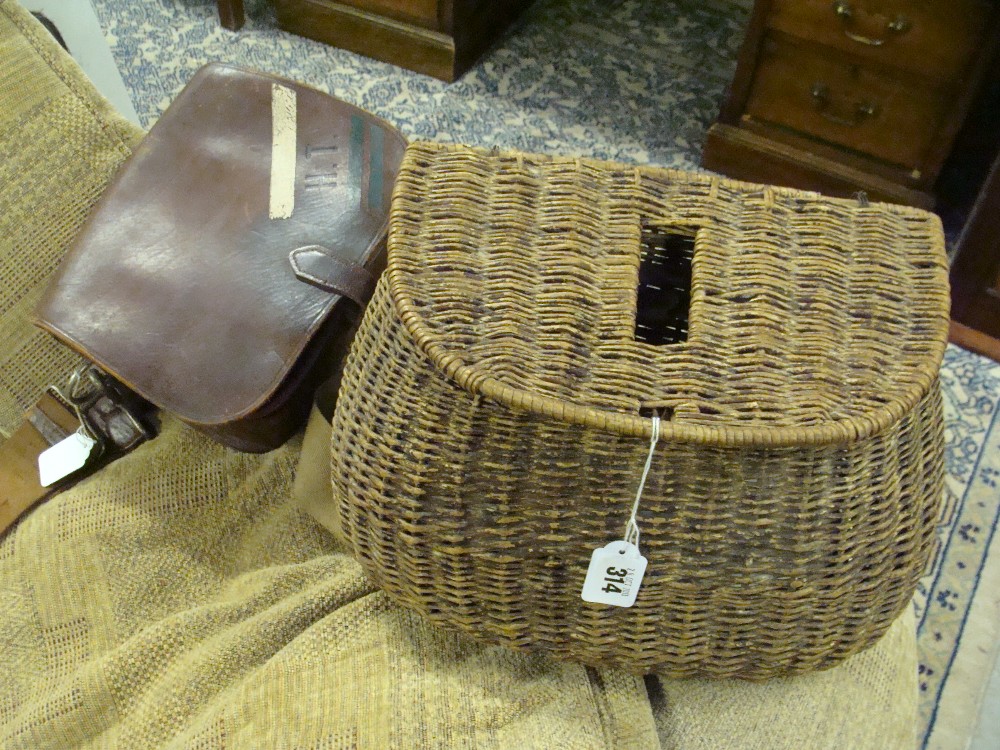 A vintage wicker fishing creel and a similar leather bag (2)