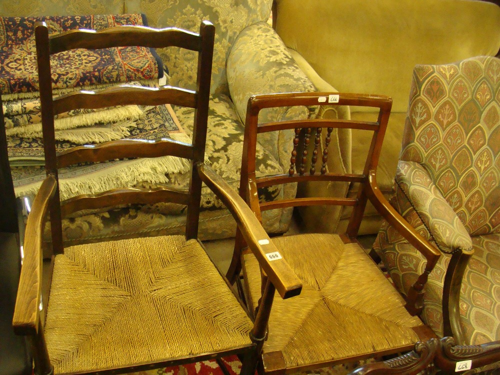 A rush seated ladder-back chair and another similar