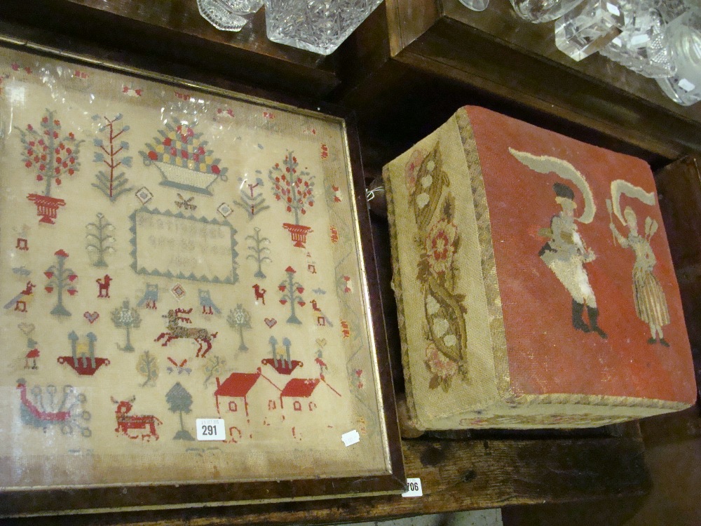 A late Victorian framed sampler dated 1890 and a Victorian footstool with original needlework