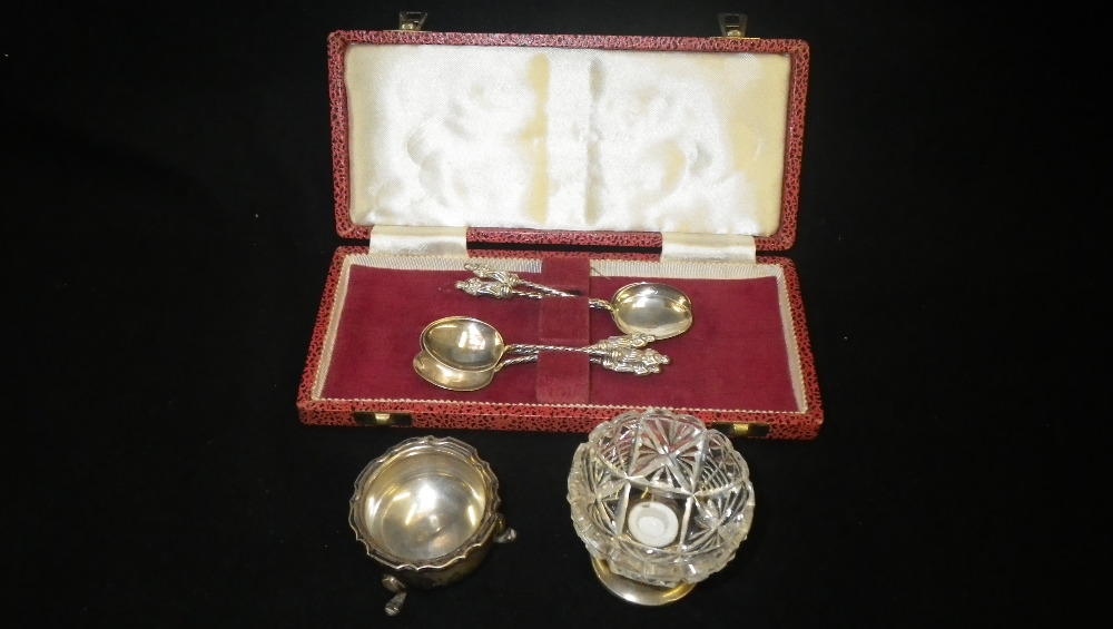 A cased set of six Apostle type teaspoons, a cut-glass and silver mounted pedestal salt and