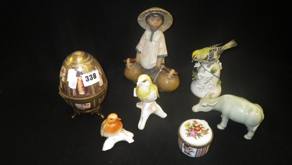 A small quantity of ceramic ornaments including a decorated egg and other items