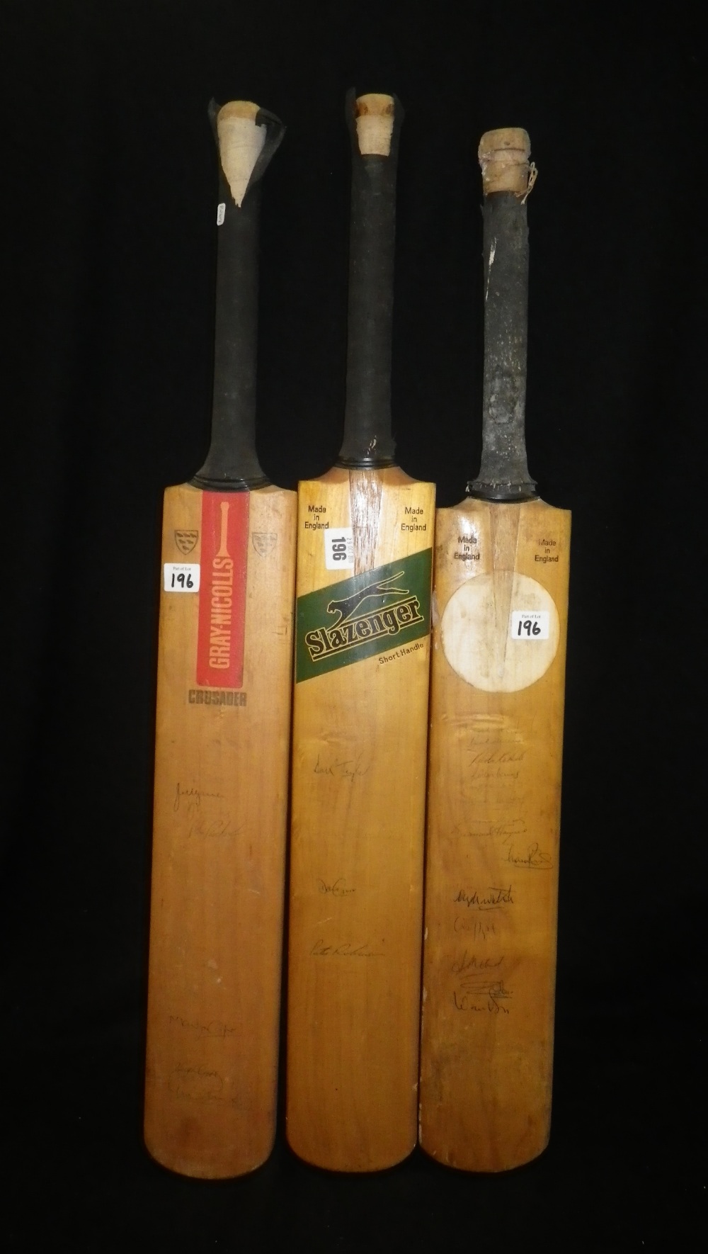 Three cricket bats, all signed, the first India 1979 with a collection of signatures below, with