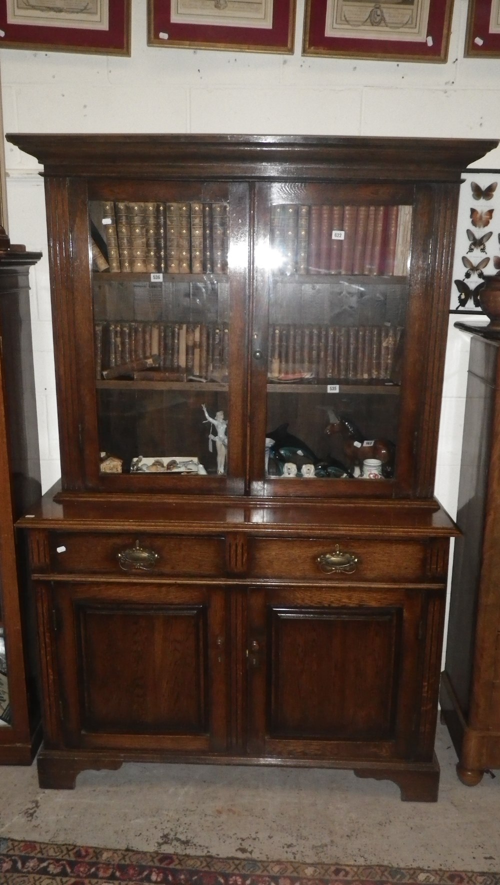 An early 20th century oak library bookcase