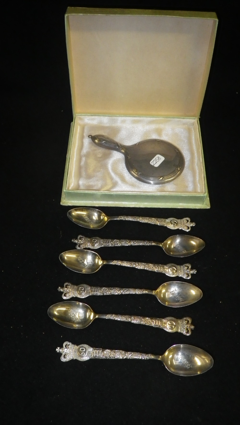 A cased set of six Victorian Jubilee teaspoons and a miniature silver-backed mirror