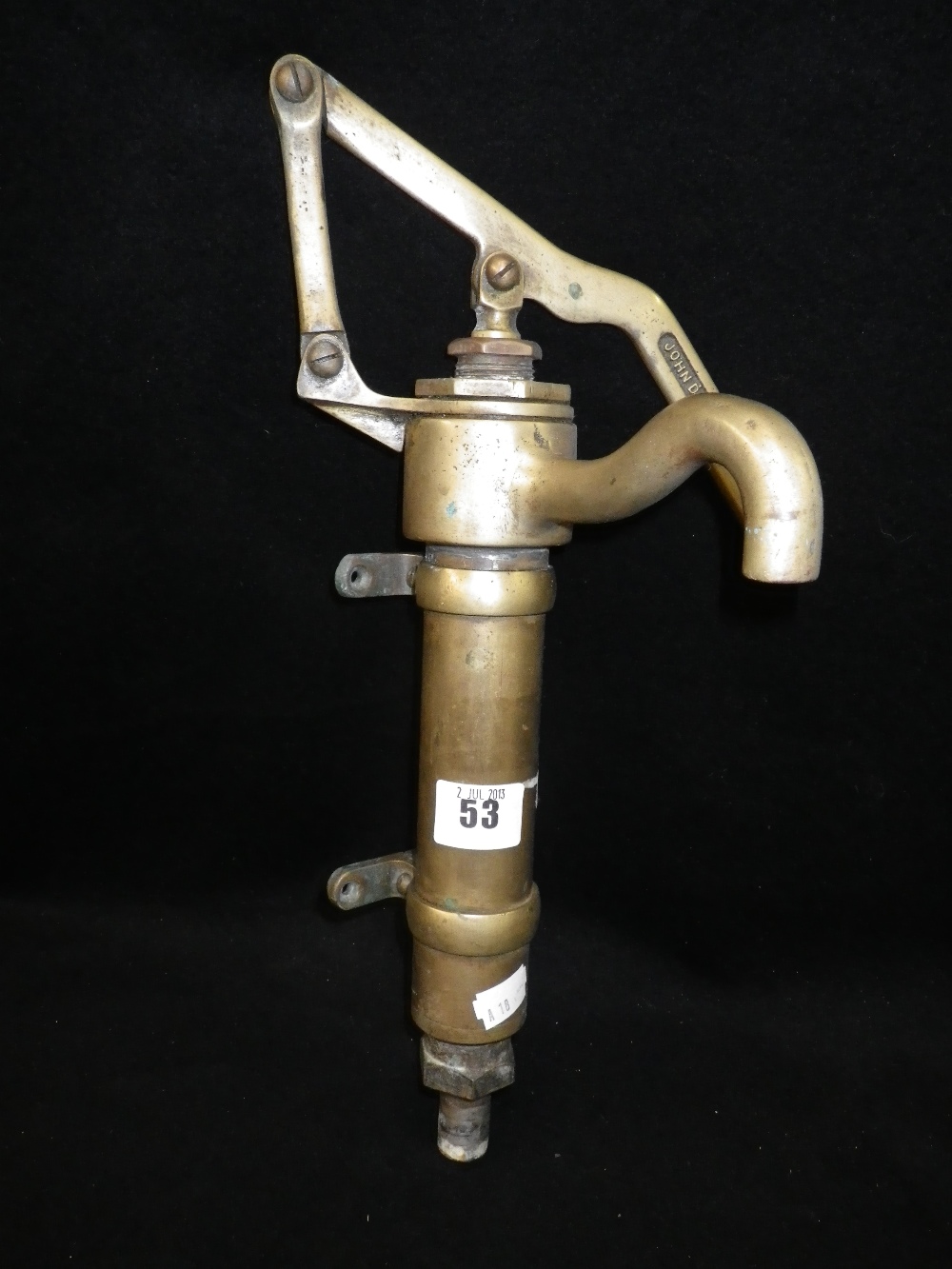 A brass hand pump by John Downton, London E14