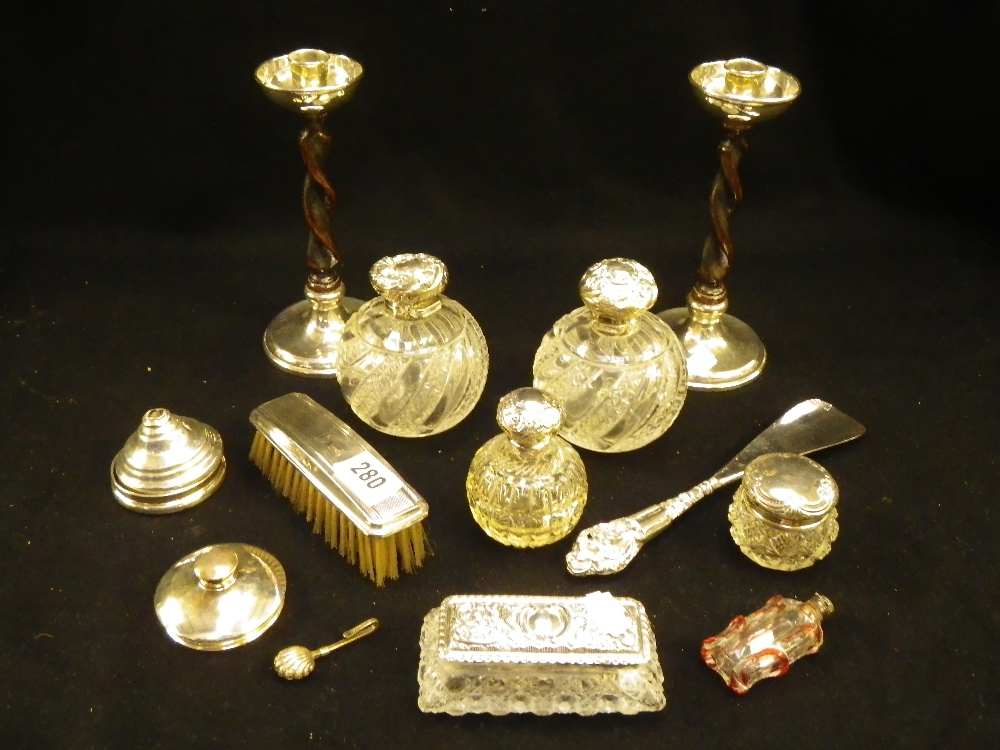 A pair of barley-twist wood and silver mounted candlesticks and a collection of other silver and