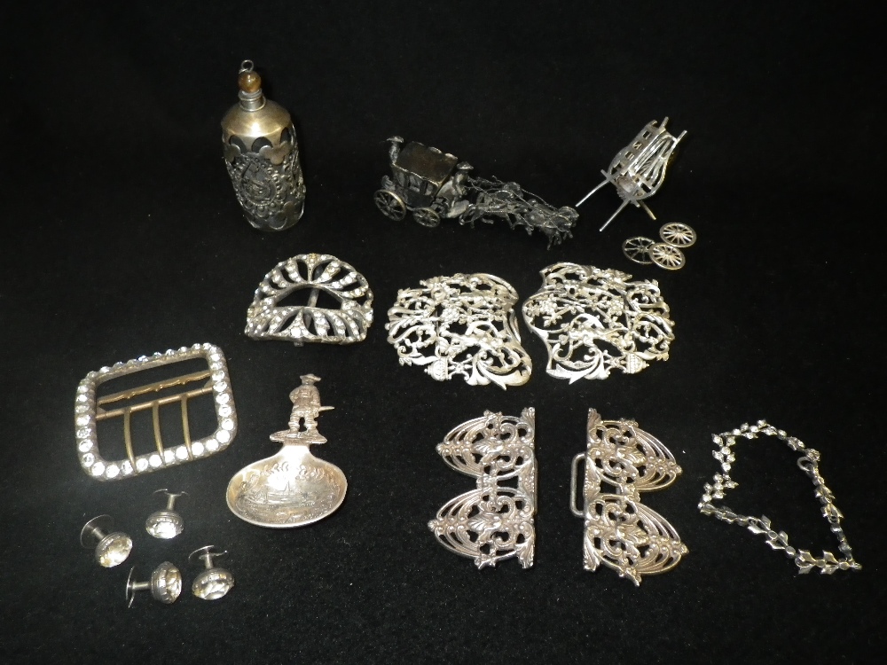 An Art Nouveau Birmingham silver buckle, a Chinese silver model of a cart and a quantity of other