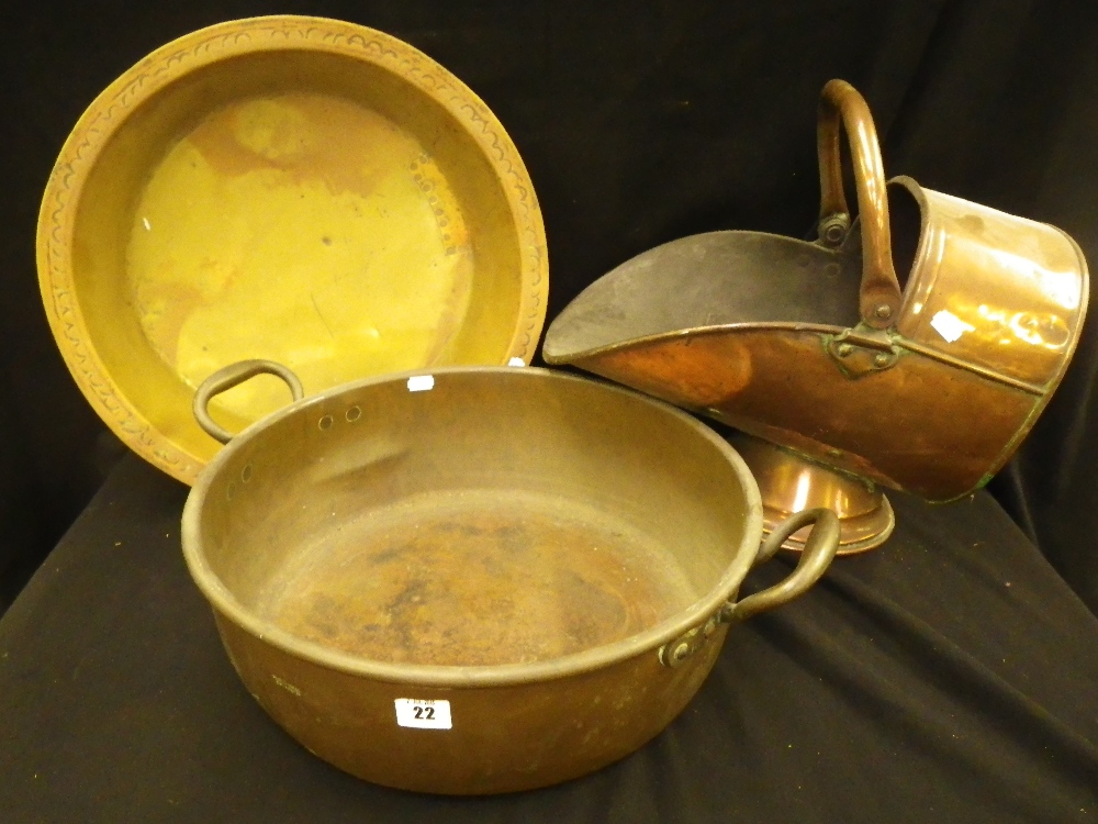 A copper preserving pan, coal scuttle and a shallow brass dish