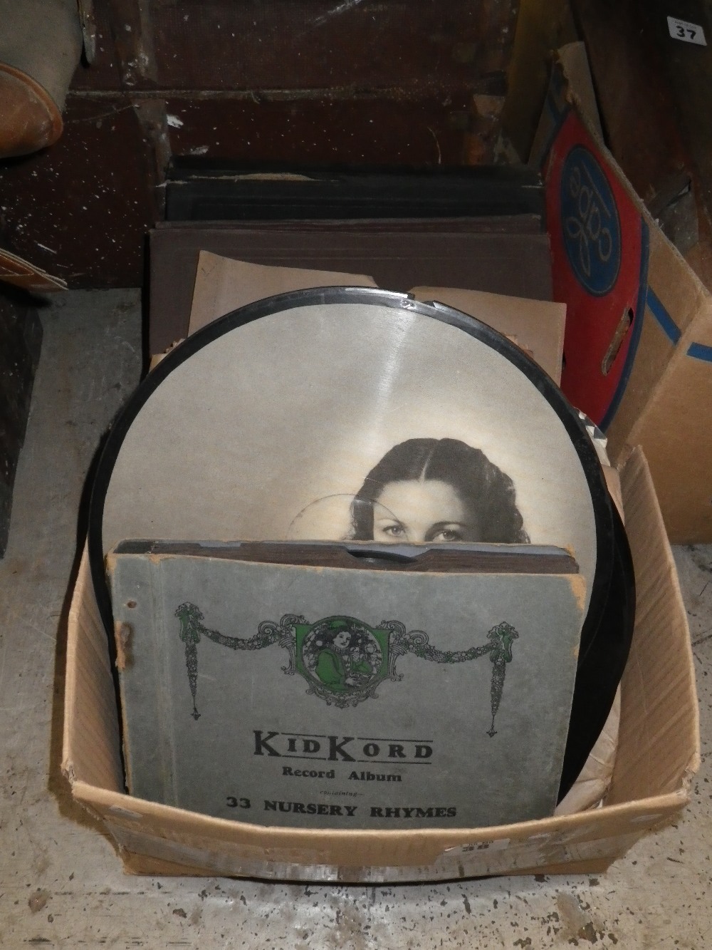 A collection of 78rpm records, including a picture disc