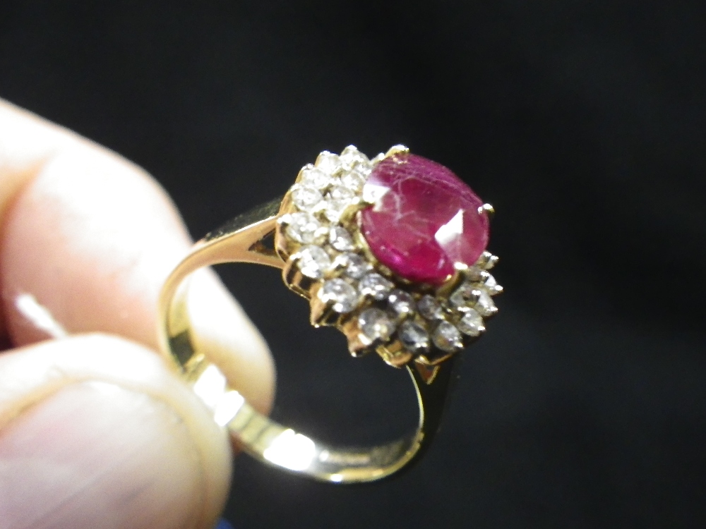 A diamond and pink stone cluster dress ring, in 18ct yellow gold