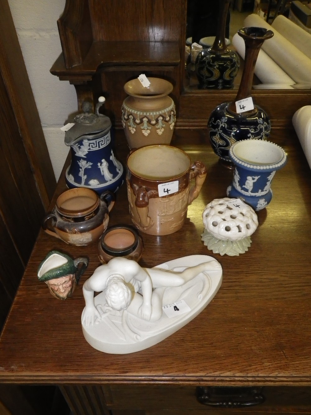 A Doulton stoneware two handled pot and a collection of similar ceramics