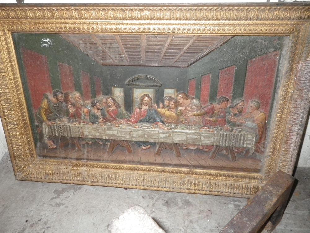 A cast-iron plaque depicting the last supper