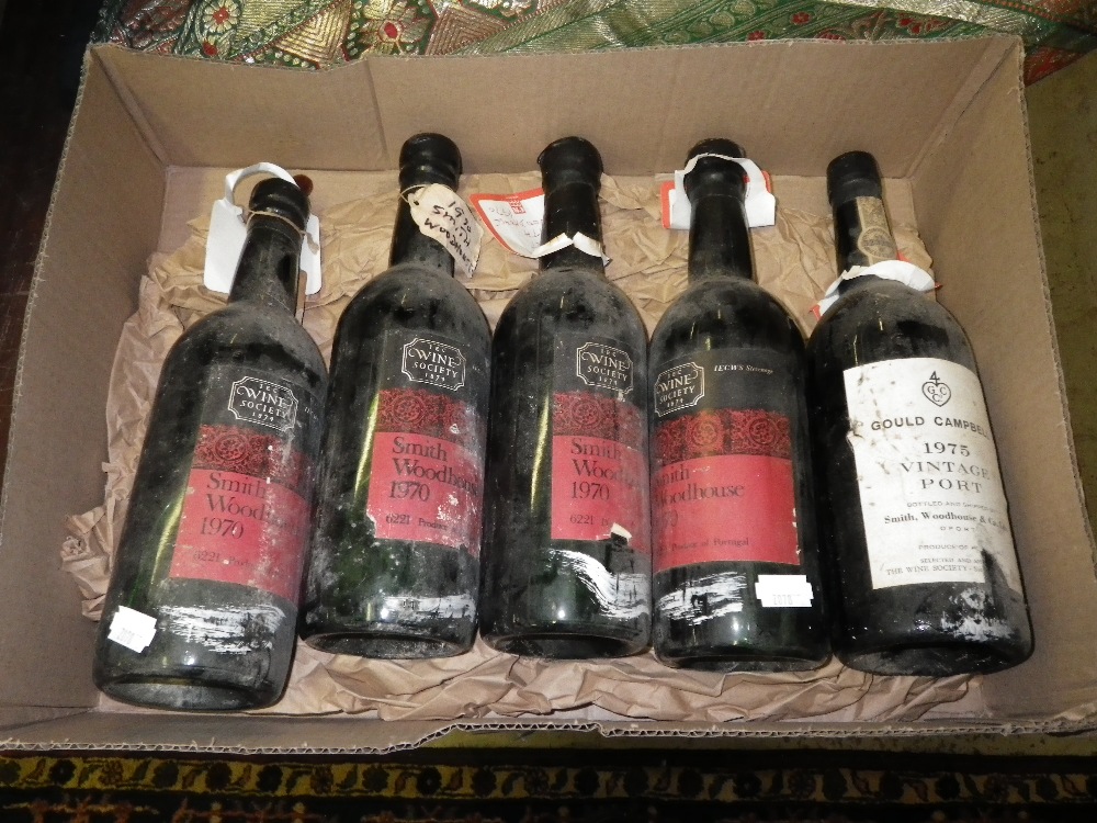 Four bottles of Smith Woodhouse port 1970 and a bottle Gould Campbell Port 1975