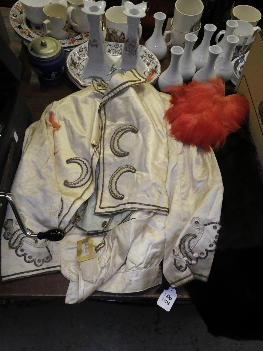 A 19th century silk child`s coat, waistcoat and trousers decorated with gold braid and a ladies