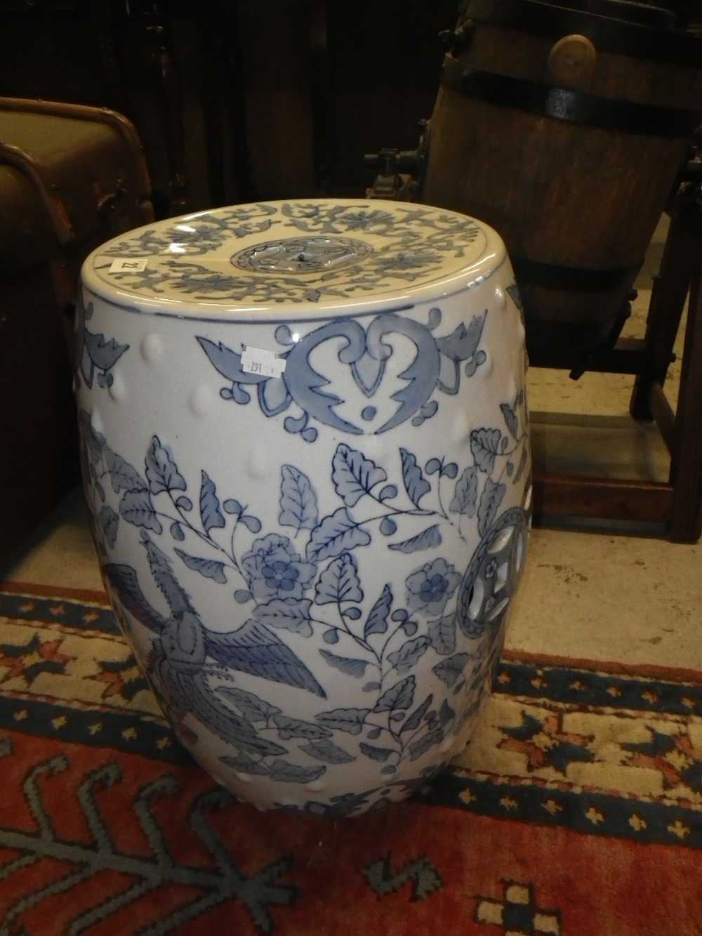 An Oriental blue and white ceramic barrel `garden seat`