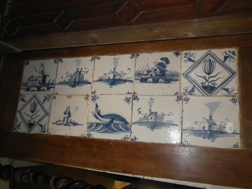 A collection of blue and white hand painted Delft tiles (inset in a table top)