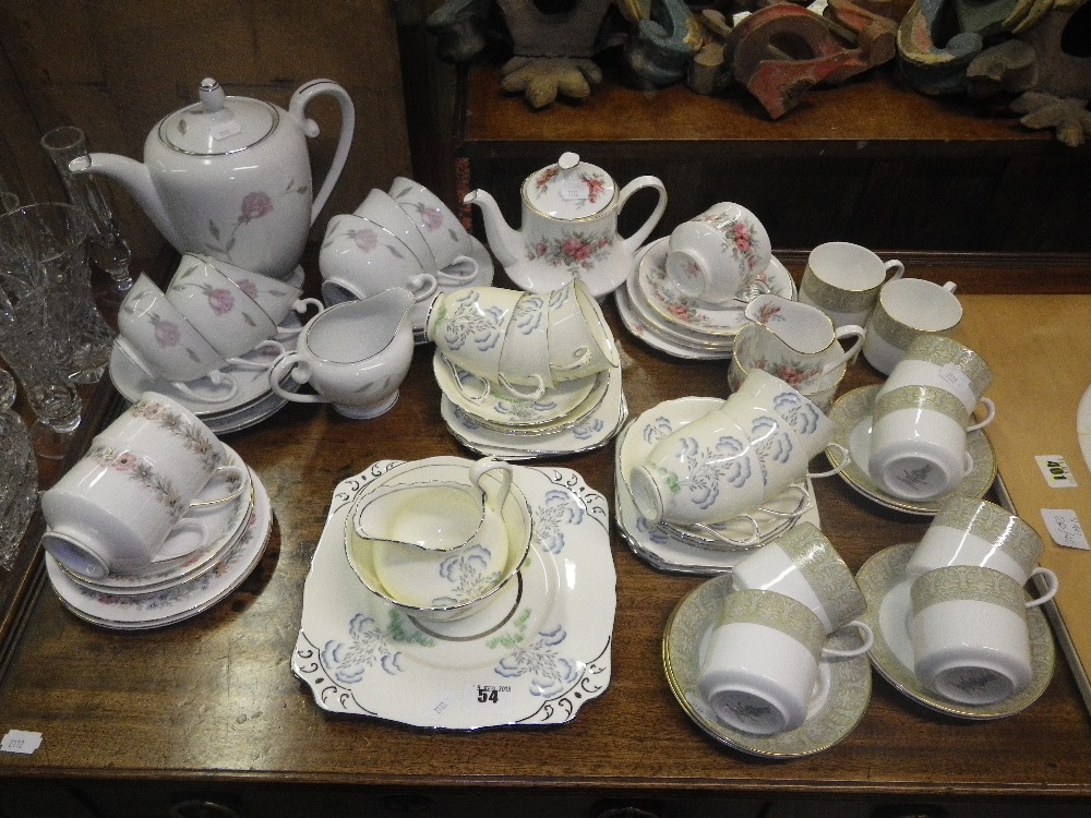 A 1930`s teaset, decorated with stylised flowers and a collection of similar teaware
