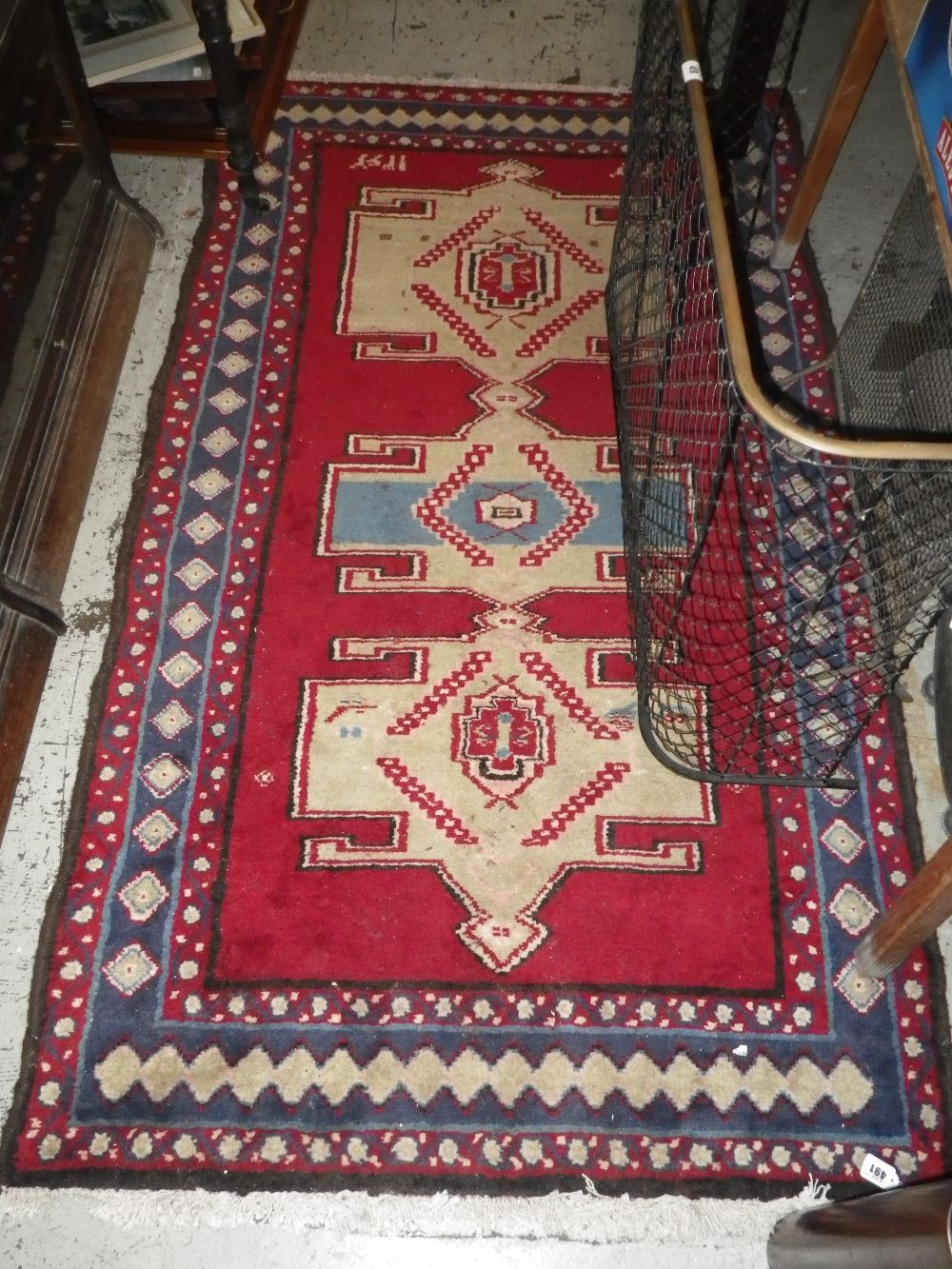 A red ground Hangoon runner with overall geometric decoration