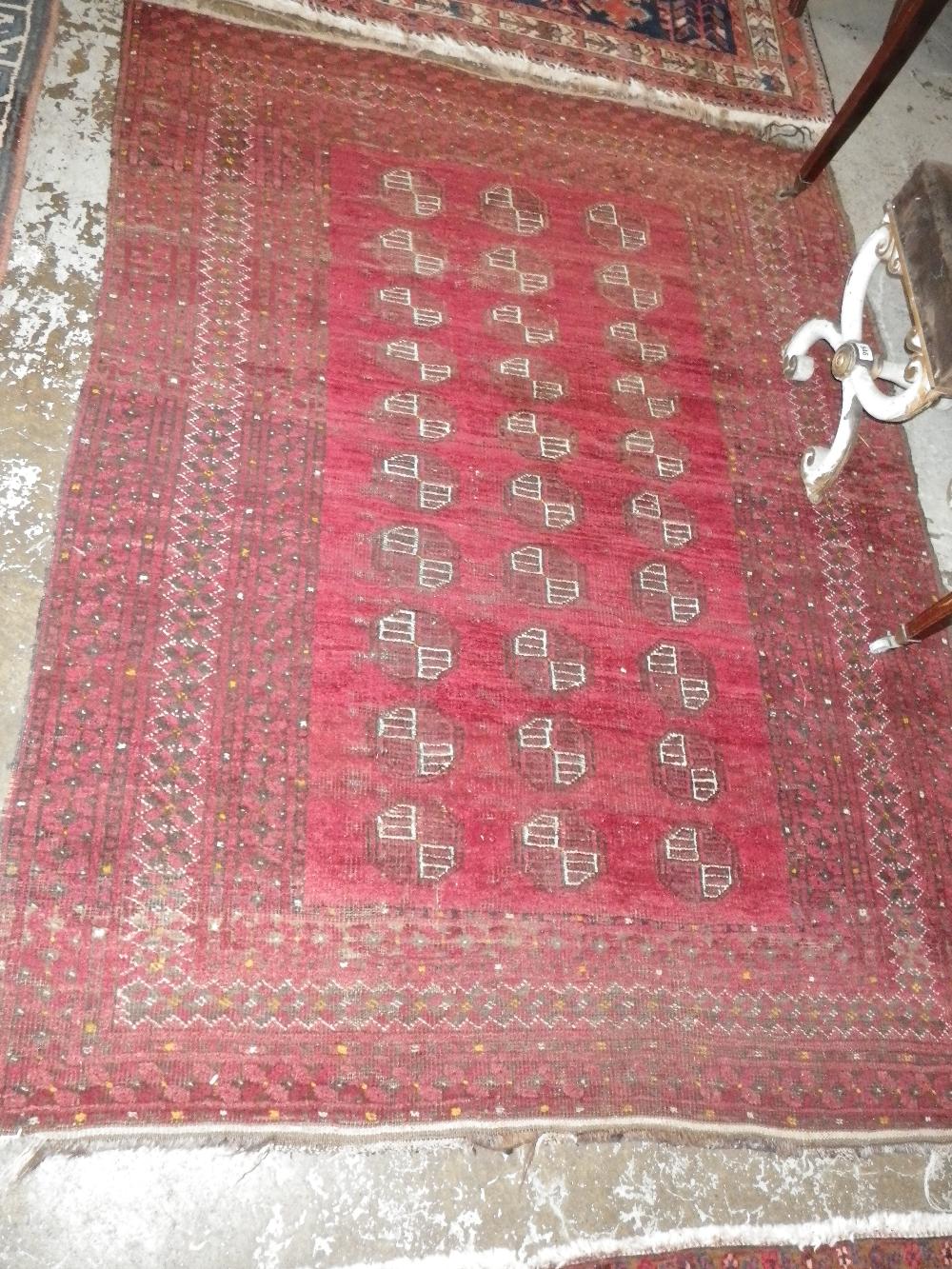 A red ground Persian rug