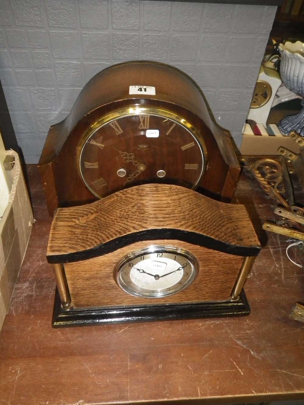 A 1950`s walnut mantle clock and another similar