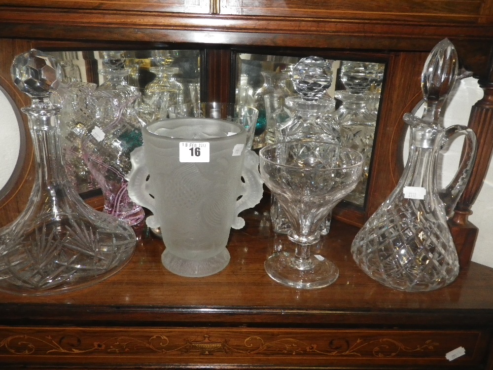 An Art Deco style glass vase, decorated with fish, a ship`s decanter and similar glassware