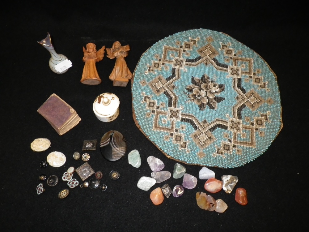 A quantity of assorted polished hardstones, a beadwork panel and other items