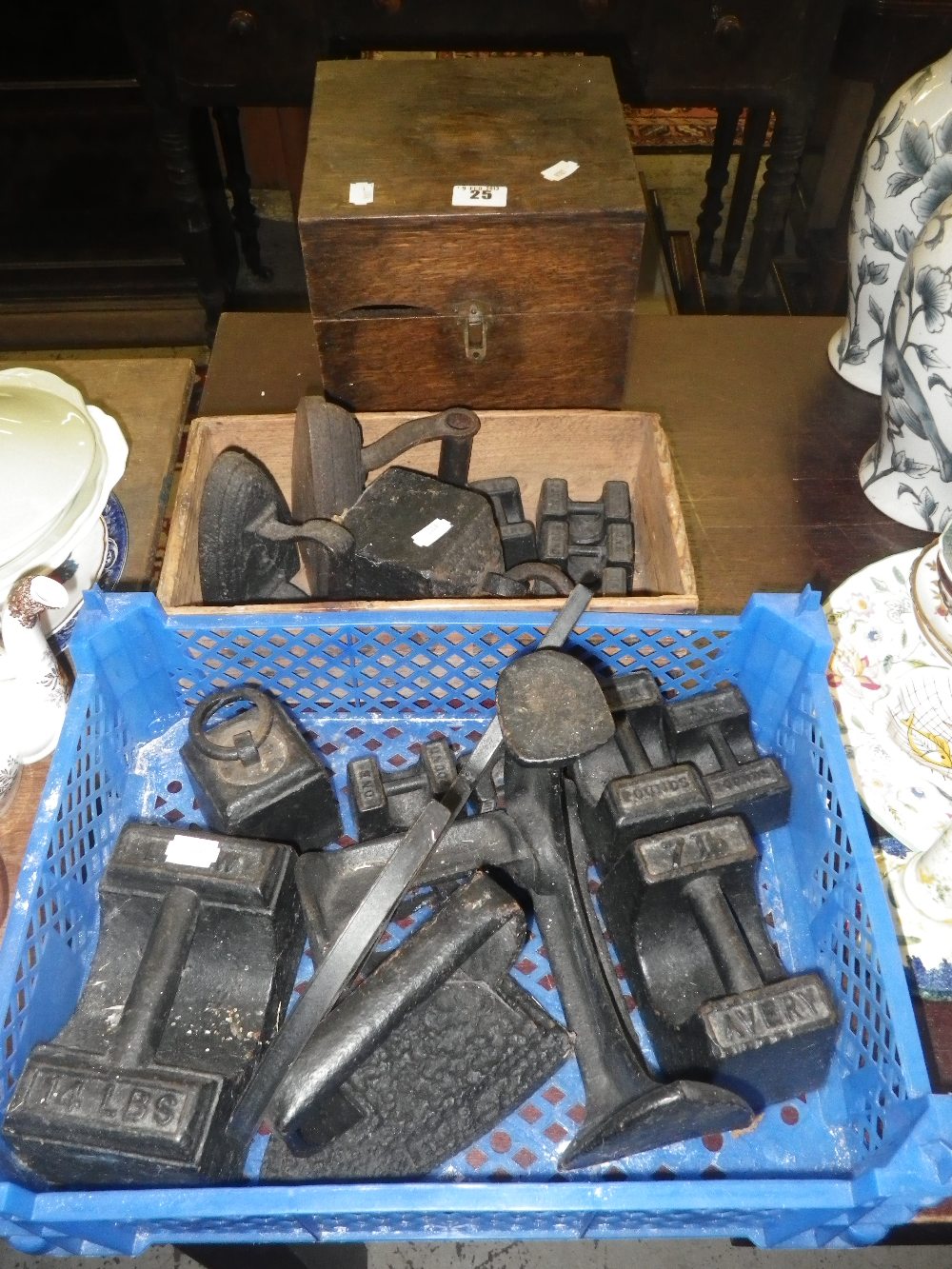 A quantity of cast-iron weights, flat irons and similar items