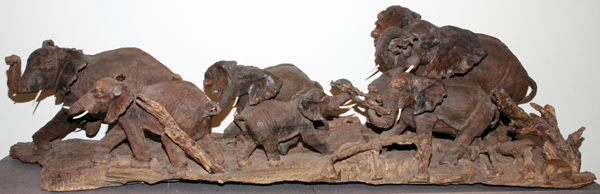 AFRICAN, HAND CARVED HARDWOOD, ELEPHANT PARADE, H 26", L 7` 10", D 26": depicting a herd of