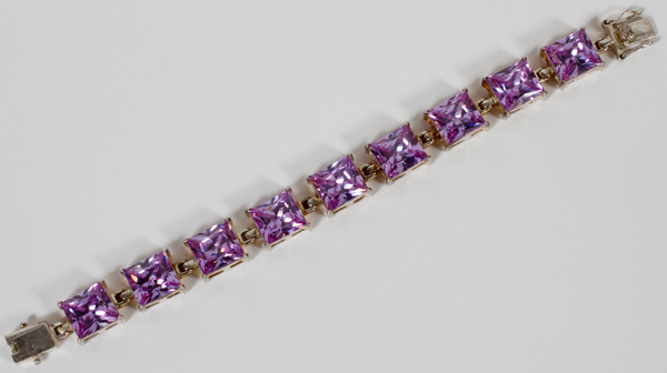 LADY`S, STERLING AND AMETHYST BRACELET, L 7 1/2": Featuring nine square cut amethysts in a