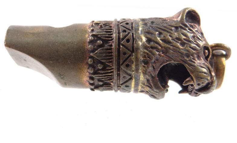 Small brass lion`s head design whistle with suspension loop, 3.5cm in length : For Condition Reports