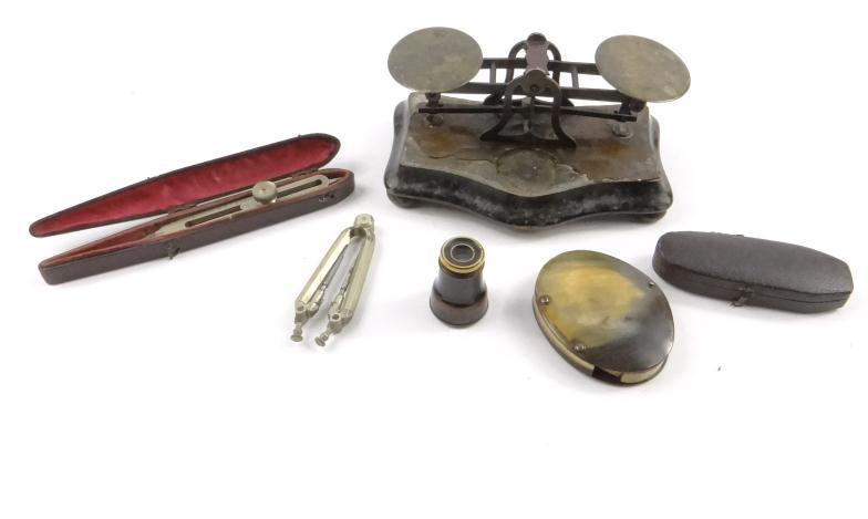 Objects comprising a horn cased magnifying loop, leather cased map measuring gauge by J. and W.E.