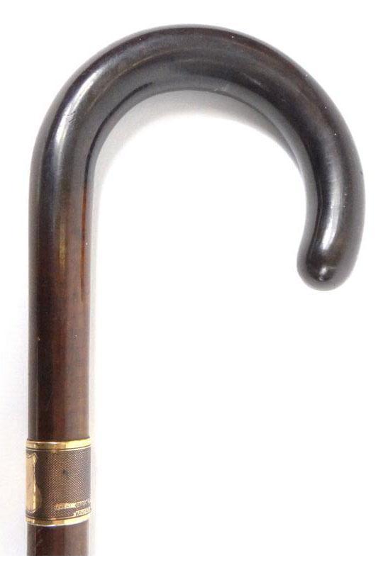 Snake wood walking cane with shepherd`s crook handle and engine turned 9ct gold collar, stamped