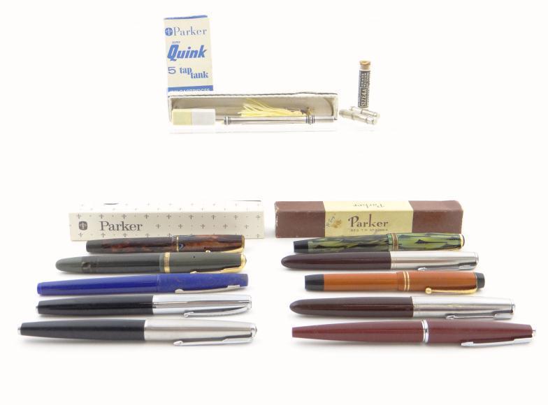 Collection of fountain and ballpoint pens including a Parker Super Quink with marbleised case, green