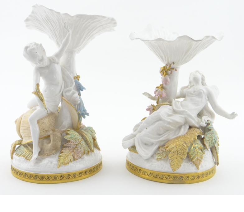 Two Victorian Copeland china centrepieces modelled with male and female fairies amongst gilded