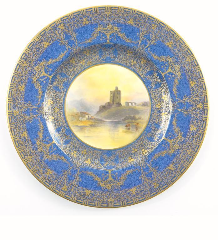 Royal Worcester cabinet plate hand painted with a view of Norham Castle within a blue and gilt